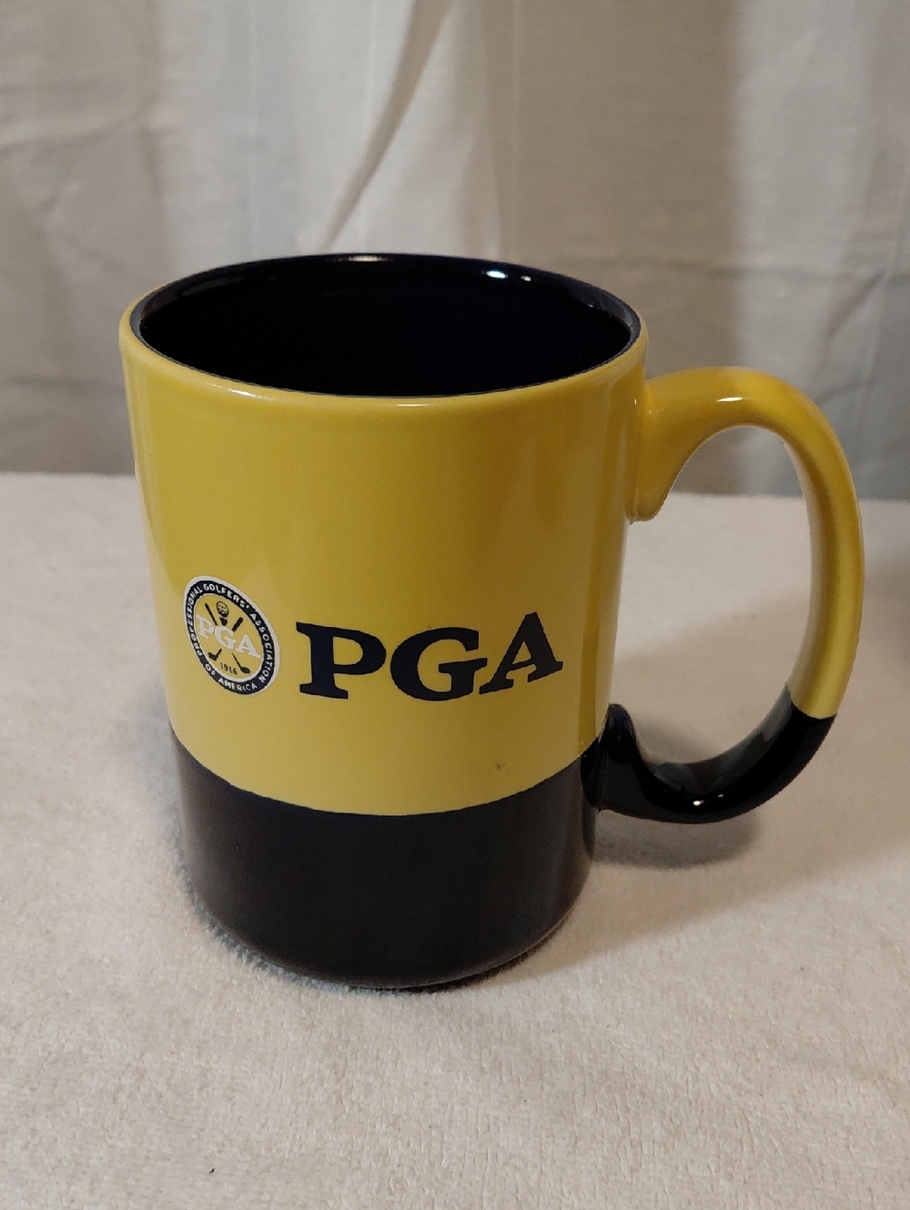 PGA Two-Tone Yellow and Black Ceramic Coffee Mug